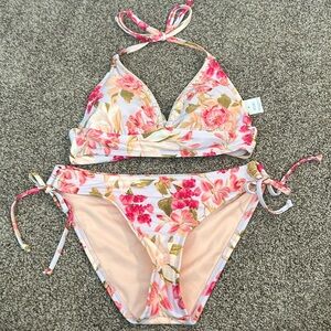 Women’s size medium Kona Sol white with pink flower swimsuit